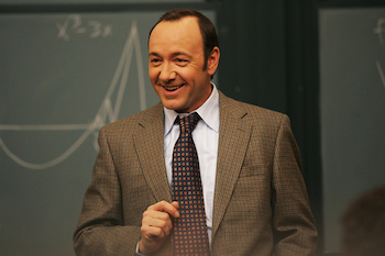 Kevin Spacey solves complex blackjack mathematics problems in the movie 21